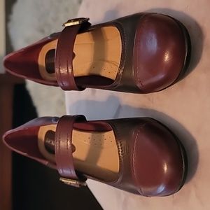 Burgundy heeled Mary Janes.